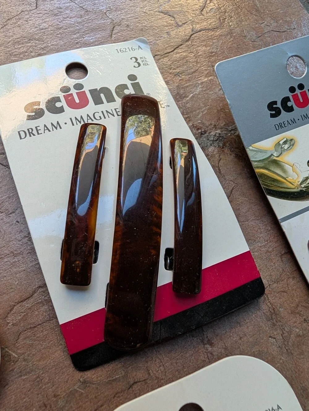 bundle of SCUNCI barrettes brown black